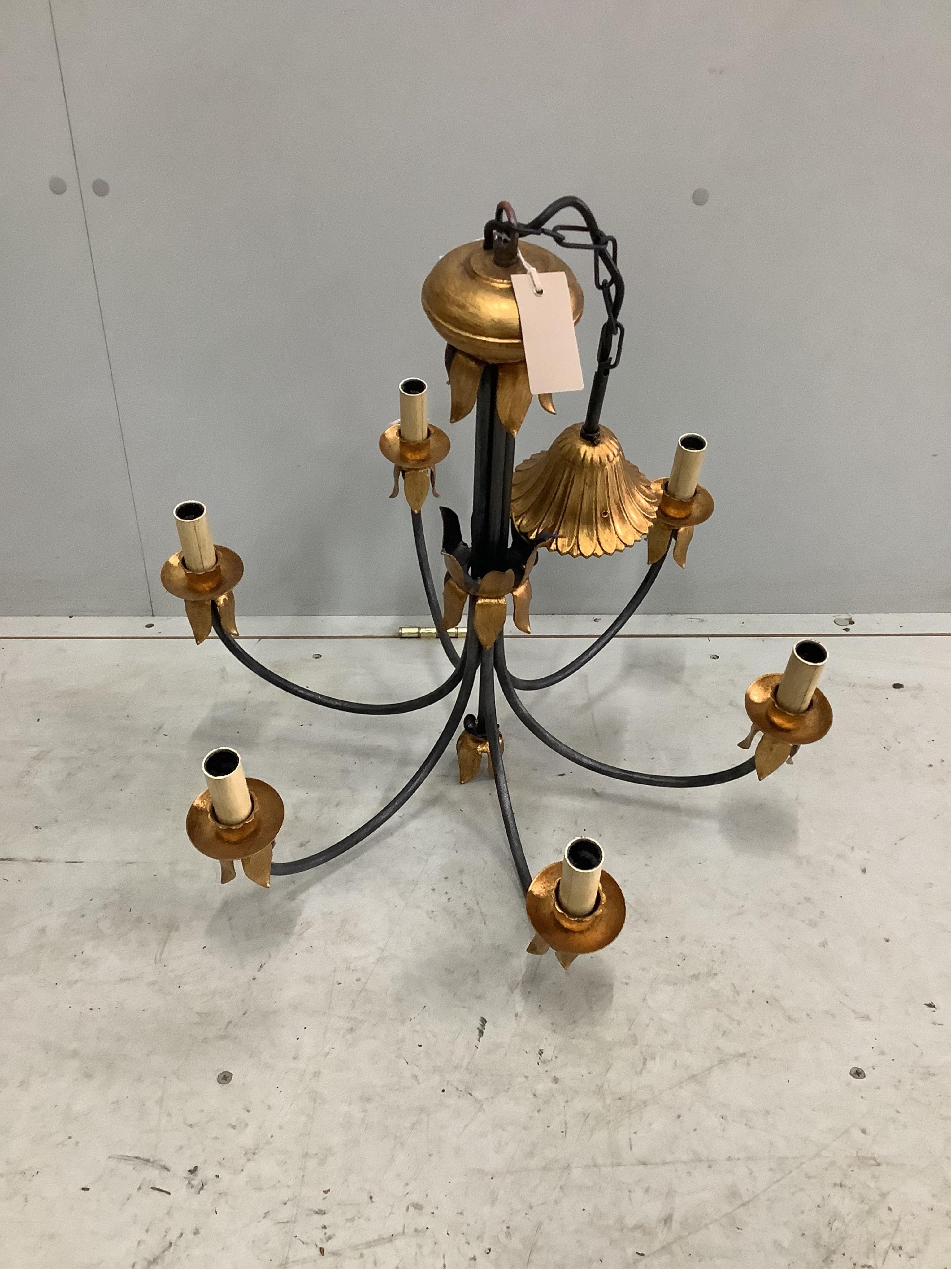 A Porta Romana parcel gilt wrought iron light fitting, height overall 85cm. Condition - good